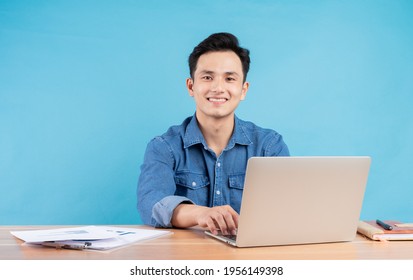 Image Of Young Asian Buisnessman On Blue Background