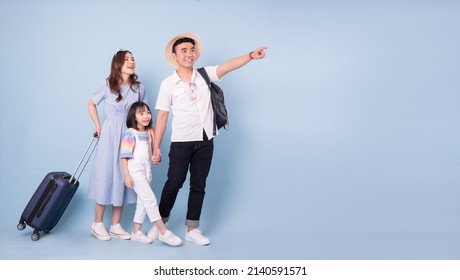 Image Of Young Asian Family Travel Concept Background