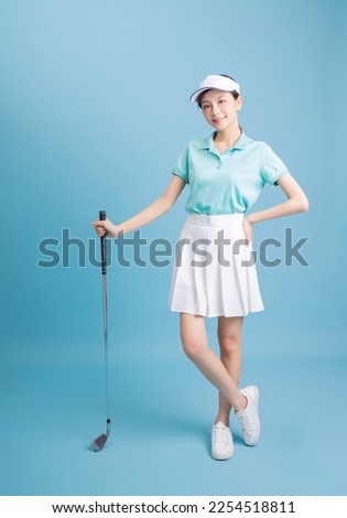 Image of young Asian female golfer