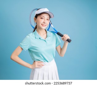 Image of young Asian girl playing tennis - Powered by Shutterstock