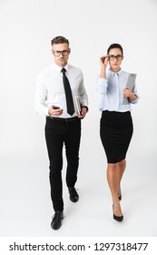 Image Of Young Business Serious Colleagues Couple Isolated Over White Wall Background.