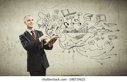 Image Of Young Businessman Holding Ipad Against Sketch Background