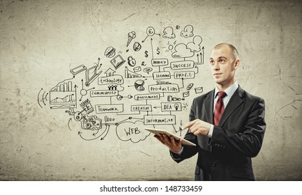 Image Of Young Businessman Holding Ipad Against Sketch Background