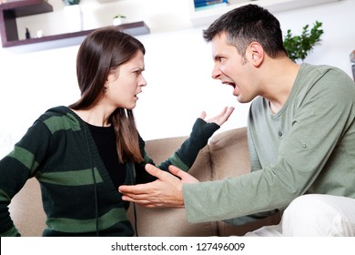 Image of young couple having fight