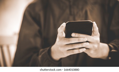 Image of young female using cellular phone