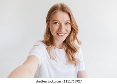 Image Of Young Happy Redhead Woman Isolated Over White Wall Background Make Selfie Looking Camera.