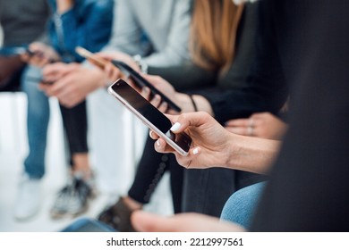 Image Of A Young Man Reading Mail On His Smartphone