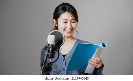 Image Of A Young Voice Actor Doing Post Recording.