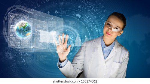 Image Of Young Woman Scientist In Goggles Against Media Screen. Elements Of This Image Are Furnished By NASA