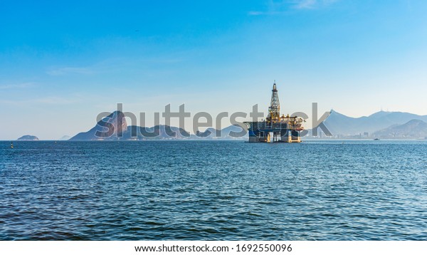 Images of an oil exploration platform in Niterói,\
Rio de Janeiro, Brazil. Several companies operate in the Guanabara\
Bay area, which is part of the Santos Basin and serves as access to\
the Campos