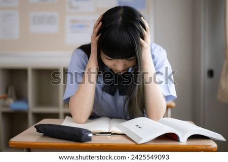 Images of students struggling with exams, grades, etc.　