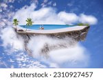 An imaginary floating island with beautiful blue sea,white sandy beaches,green spaces and coconut palms.There were white clouds floating around the island.
