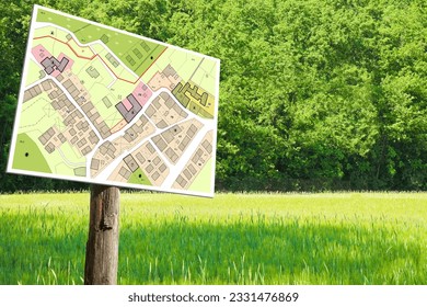 Imaginary General Urban Plan concept - Zoning regulations with zoning districts, urban destinations, land use, buildable areas and land plot against a signpost in a rural scene