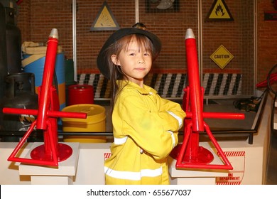  Imagination of children.Children and learning.The child is playing as a firefighter.