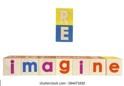 RE IMAGINE Concept Spelled Out With Toy Blocks. Isolated.