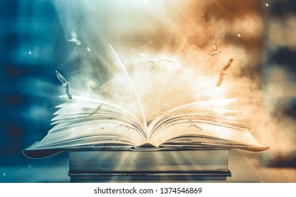 Imagine a picture book of an ancient book opened on a wooden table with a sparkling golden background. With magical power. magic. lightning around a glowing glowing book In the room of darkness - Powered by Shutterstock