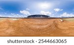 An immersive 360-degree equirectangular spherical panoramic photograph of the Sydney International Speedway as viewed from near the grand stand inside the track.