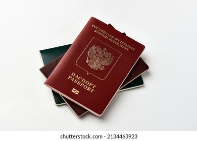 Immigration Law And Citizenship Rights. Russian Federation Passport On White Background With Copy Space, Close-up