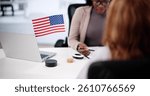 Immigration Lawyer guides African woman through US visa application process.
