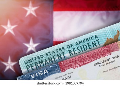 Immigration VISA United States of America. Green Card US Permanent resident. Work and Travel documents. US Immigrant. Embassy USA. Visa in passport. American government flag on background. 
 - Shutterstock ID 1981089794