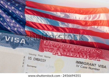 Immigration VISA United States of America. Green Card US Permanent resident for family. Work and Travel documents. US Immigrant. Embassy USA. Visa in passport. U.S.A. Government. U.S. American flag