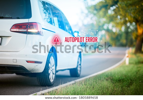 Immobile intelligent autonomous car\
due to autopilot software error stands at side of the\
road.