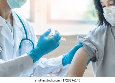 Immunization And Vaccination For Flu Shot, Influenza, HPV Or Covid-19 Prevention With Young Teenager Child Girl Having Vaccine Injection For World Immunization Week And International HPV Awareness Day