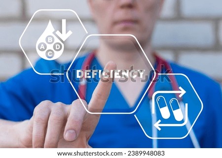 Immunologist using virtual interface presses word: DEFICIENCY. Deficiency healthcare concept. Vitamin deficiency. Inadequate nutrition. Health problem. Mineral malnutrition.