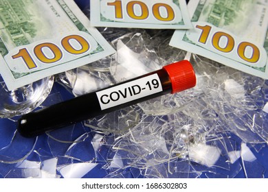 Impact Of Corona Virus Crisis Shutdown On Global Economy Concept: 3 Hundred Dollar Money Bill Notes On Pile Of Broken Shattered Glass Shards, Covid-19 Blood Vial, Blue Background 