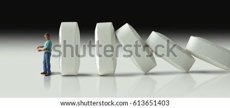 Impending doom and demise of man with pharmaceutical opioid pain medication addiction represented by huge row of pills crashing over like dominoes to eventually crush the man.