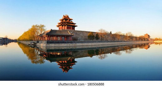 Imperial Palace over lake in the morning in Beijing.