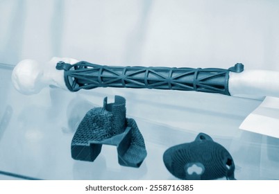 Implants and prostheses printed on 3D printer from biocompatible titanium powder. Individualized human implants hip joints and implants for replacing tubular bones. Endoprostheses. Bioengineering