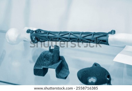 Implants and prostheses printed on 3D printer from biocompatible titanium powder. Individualized human implants hip joints and implants for replacing tubular bones. Endoprostheses. Bioengineering
