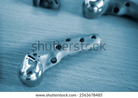 Implants and prostheses printed on 3D printer from biocompatible titanium powder. Jaw fixation plates for human skull. Endoprostheses. Bioengineering