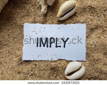 Imply writting on beach sand background.