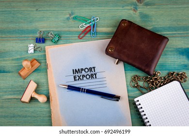 Import Export concept. Notebook on a bright green background. Office stationery accessories