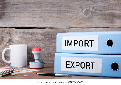 Import And Export. Two Binders On Desk In The Office. Business Background