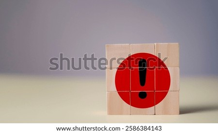 Important Error Alert red Flag Exclamation Icon on wooden cube block stacking for Warnings and Communication Mistakes, danger signs, and critical attention notifications.