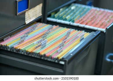 Important financial and investment documents are stored in filing cabinets at the office. - Shutterstock ID 2101590100