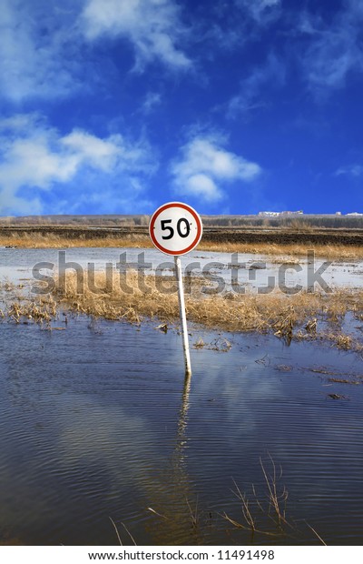 Important mark on the flooded\
road
