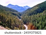 The imposing rocky glacial peaks of Glacier National Park in northwest Montana straddle the U.S.-Canadian border. The Canadian side of the park is known as Waterton Lakes National Park in Alberta.