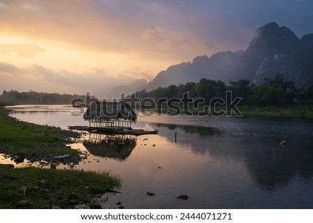Imposing scenery with mountain range by the river in Dong Cho village, Kim Boi district, Hoa Binh province, Vietnam