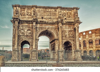 the imposing walls of a Roman triumphal arch and amphitheater