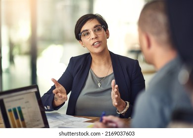 Impossible Only Means That You Havent Found The Solution Yet. Shot Of Colleagues Having A Discussion In A Boardroom.