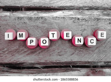 Impotence, word cube with background.