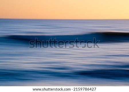 Impressionist coastal abstract form and colors at sunset.