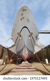 The Impressive Bow Of A Cruise Ship – Passenger Ship Photographed From Below The Water Line While The Ship Is In Dry Dock At The Shipyard.