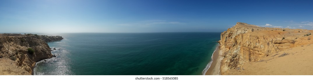 Impressive Cliffs With Turquoise Ocean At The Coast At Caotinha, Angola