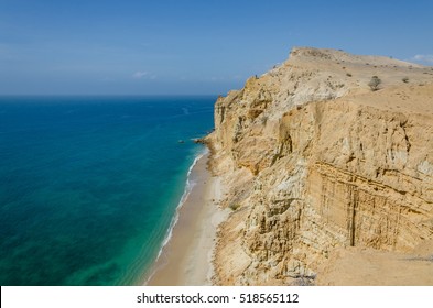 Impressive Cliffs With Turquoise Ocean At The Coast At Caotinha, Angola