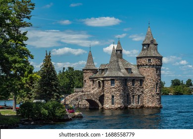 Impressive looking small castle in the middle of a lake